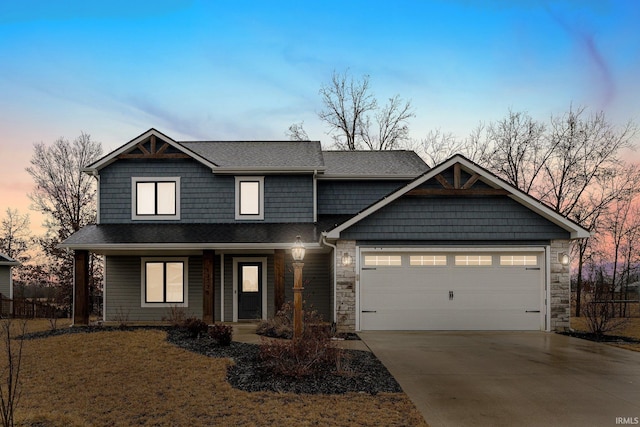 craftsman house featuring a garage