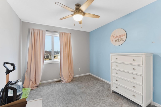 misc room featuring light carpet and ceiling fan