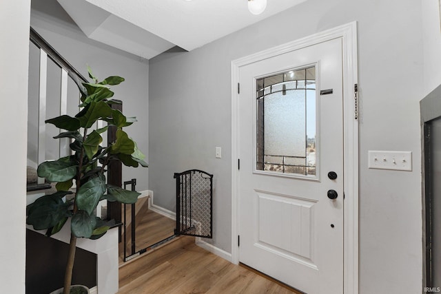 doorway to outside with light hardwood / wood-style floors