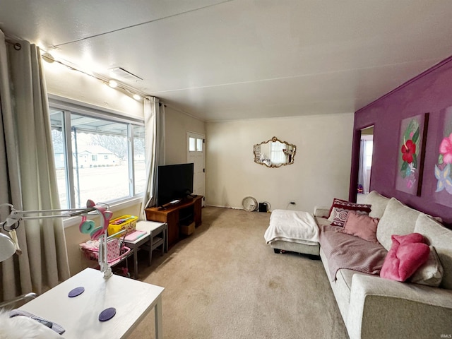 living room with light colored carpet