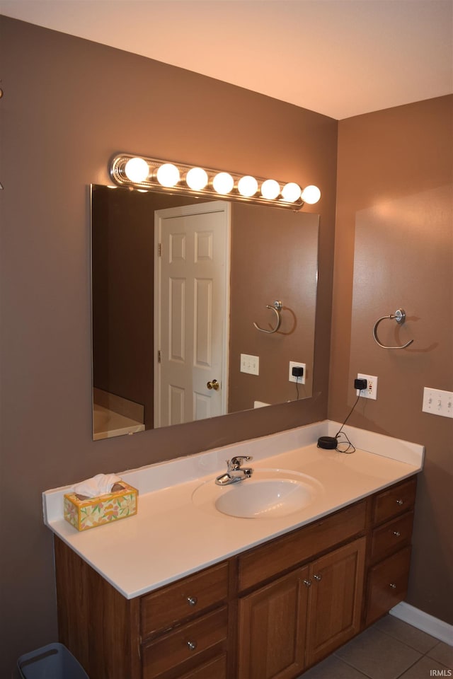 bathroom with vanity and tile patterned floors