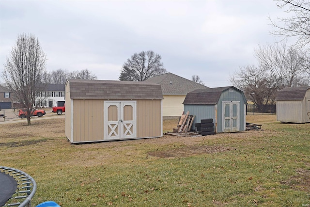 view of outdoor structure with a lawn