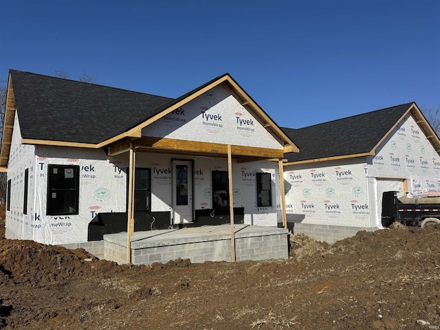 property in mid-construction featuring a porch