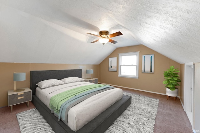 carpeted bedroom with ceiling fan, lofted ceiling, and a textured ceiling