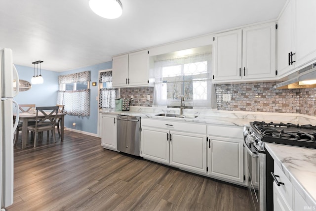 kitchen with white cabinetry, sink, and appliances with stainless steel finishes