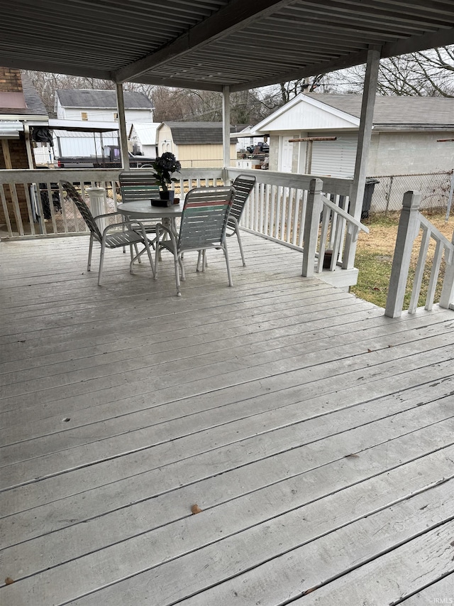 wooden deck featuring an outdoor structure