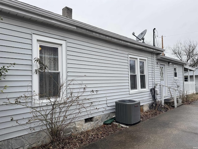 view of home's exterior featuring cooling unit