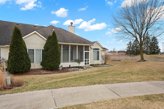 exterior space featuring a front yard