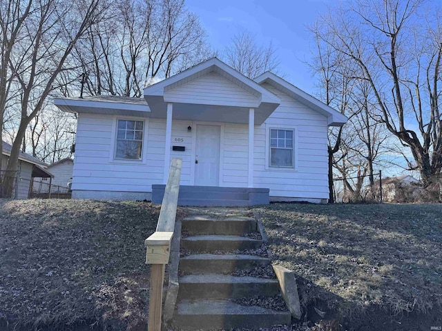 605 W 10th St, Muncie, IN 47302 - view of front of home with a porch