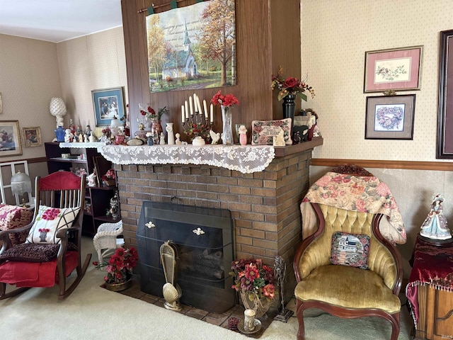 carpeted living room featuring a fireplace