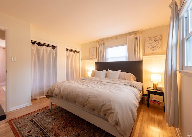 bedroom with light hardwood / wood-style floors