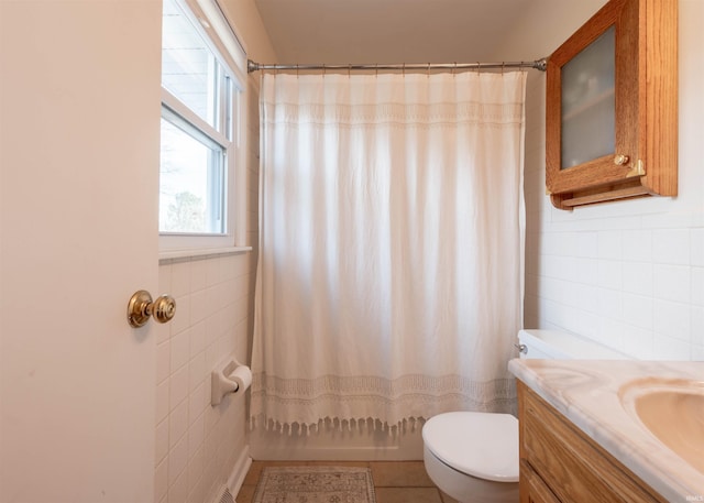 full bathroom featuring tile walls, vanity, shower / bath combination with curtain, and toilet