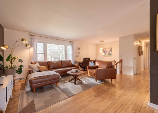 living room with light wood-type flooring