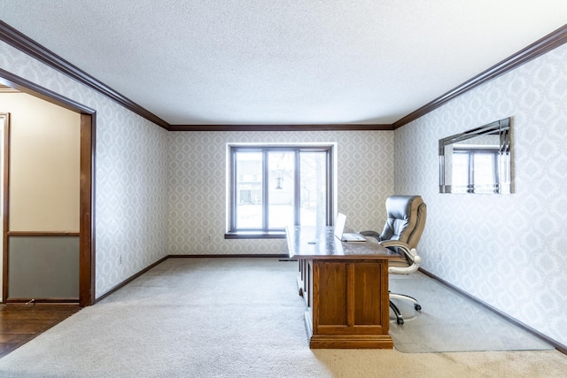 carpeted home office with crown molding, a textured ceiling, and a wealth of natural light