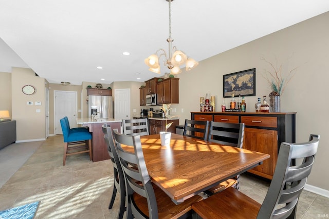 dining room with a chandelier