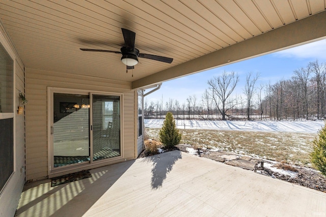 snow covered patio with ceiling fan