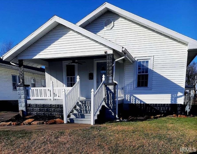 bungalow-style home with a porch