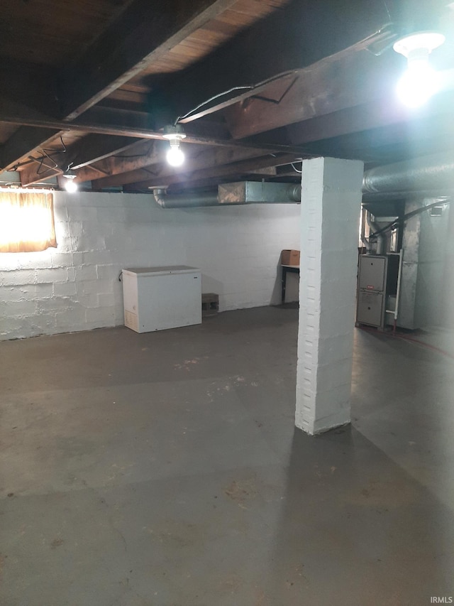 basement with fridge