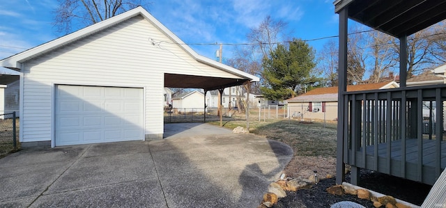 view of side of property with a garage and an outdoor structure