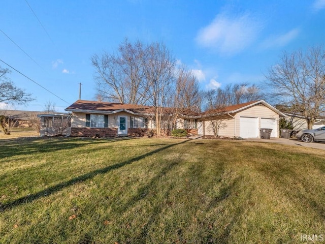 ranch-style home with a garage and a front yard