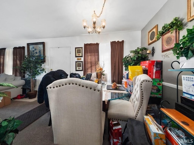 dining room featuring a notable chandelier and carpet floors