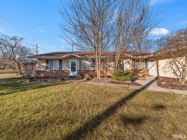 ranch-style house with a front yard