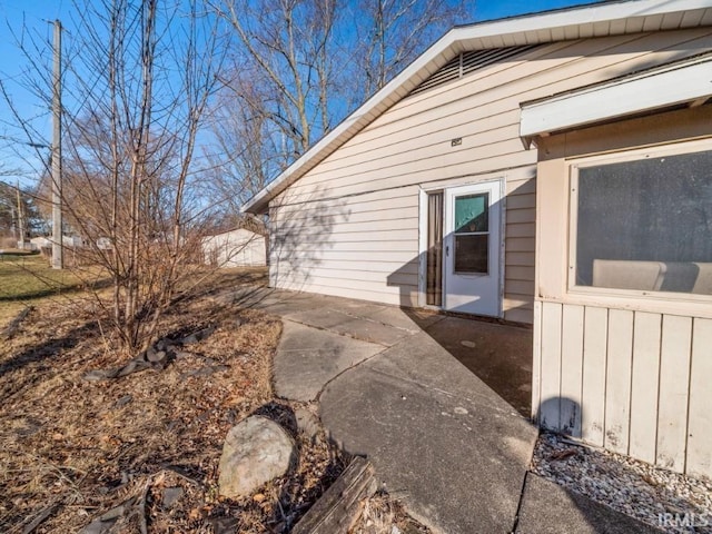 view of property exterior featuring a patio