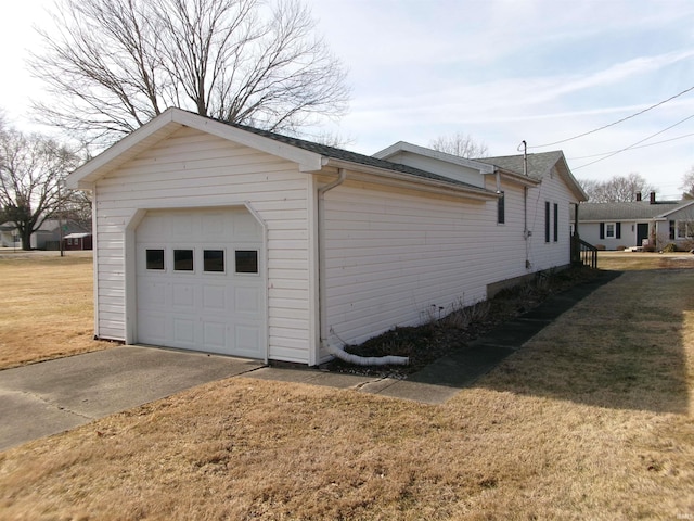 garage with a lawn