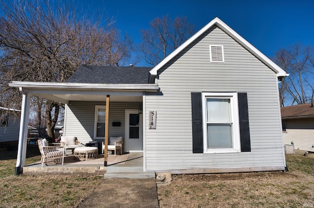 rear view of house featuring a patio area