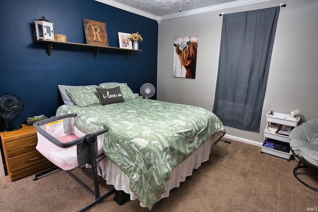 carpeted bedroom with ornamental molding and a textured ceiling