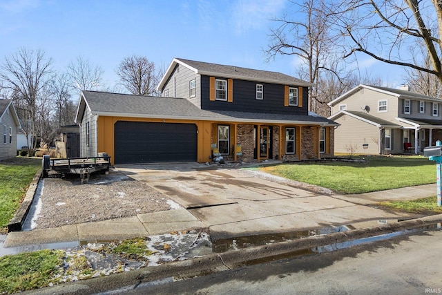 front facade featuring a garage and a front lawn