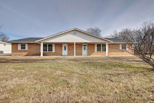 single story home with central AC and a front yard