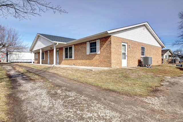 view of property exterior featuring central AC