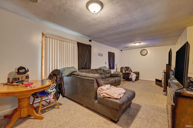 living room with light carpet and a textured ceiling