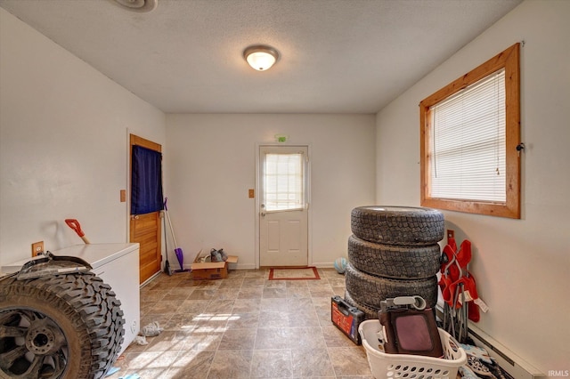 interior space featuring a baseboard radiator