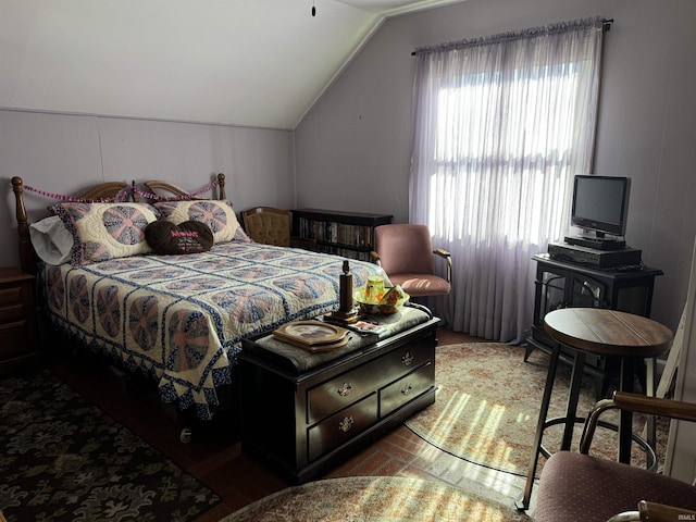 bedroom featuring vaulted ceiling