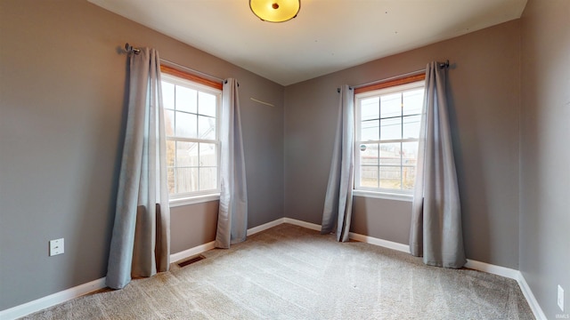 view of carpeted spare room