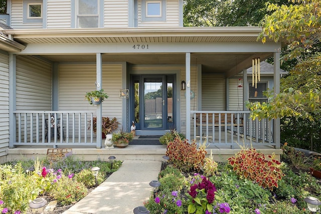 doorway to property featuring a porch