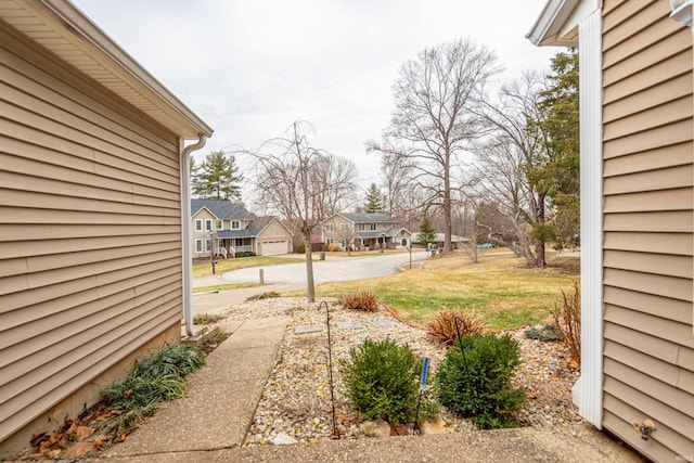 view of yard featuring a garage