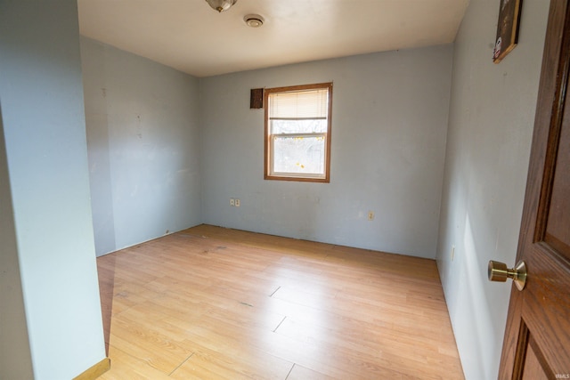 empty room with light wood-type flooring