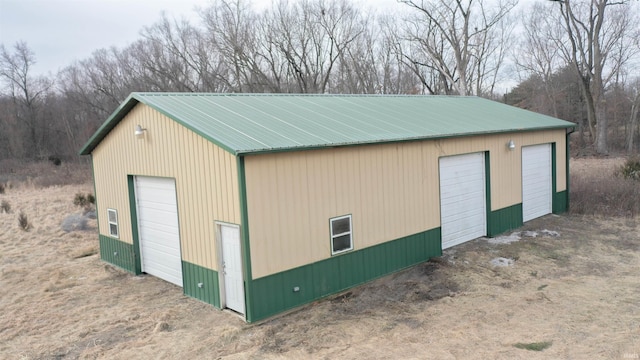 view of outbuilding with a garage