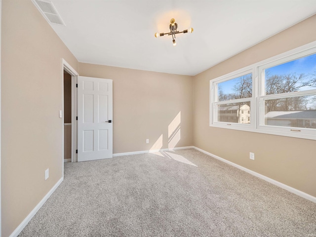 view of carpeted spare room