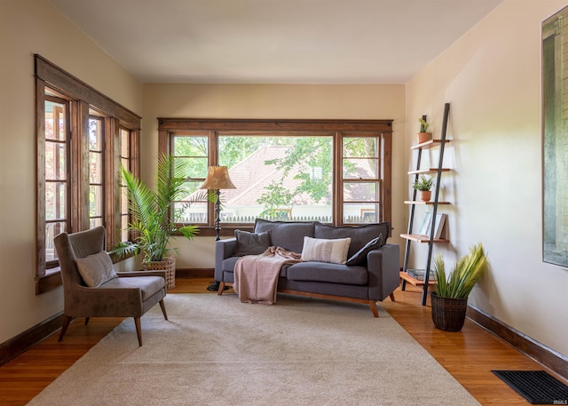 sitting room with light hardwood / wood-style floors