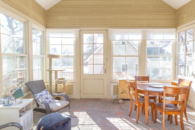 sunroom / solarium with lofted ceiling