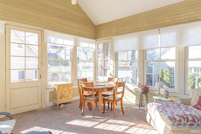 sunroom / solarium with lofted ceiling