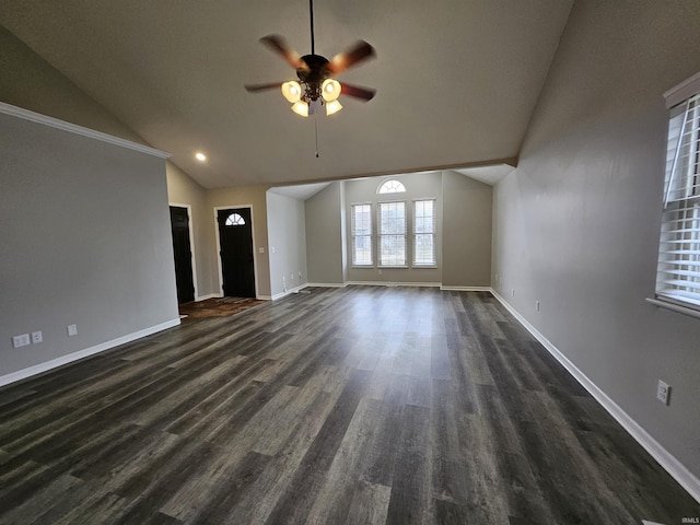 unfurnished living room with dark hardwood / wood-style flooring, lofted ceiling, and ceiling fan