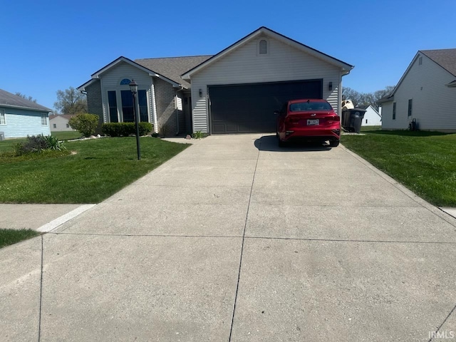 ranch-style home with a garage and a front yard