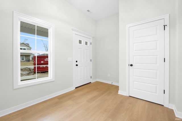 entryway with light wood-type flooring