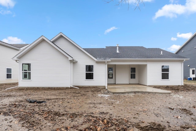 back of property with a patio area