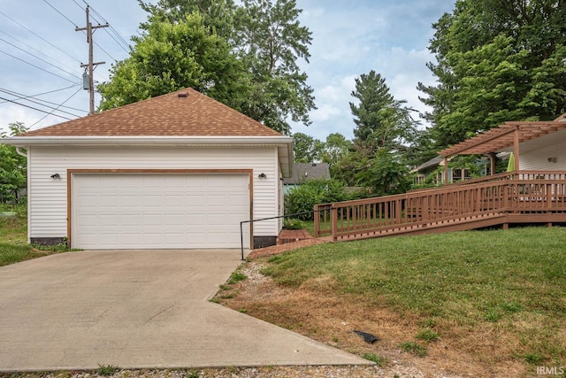 exterior space with an outbuilding, a wooden deck, a garage, and a pergola